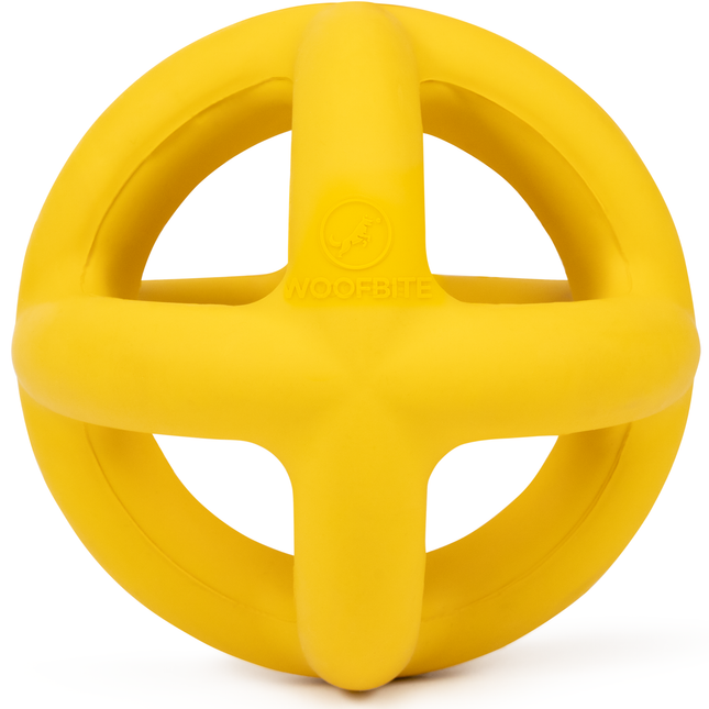 Yellow rubber ball with handles on a white background