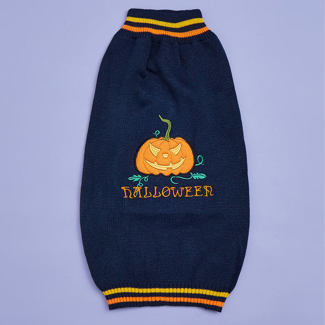 Navy blue dog sweater with Halloween pumpkin design on a purple background