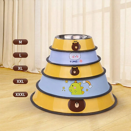 Set of three tiered pet bowls with cartoon designs on a wooden floor.
