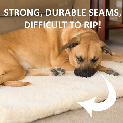 Dog lying on a textured pet mat with text about strong, durable seams.