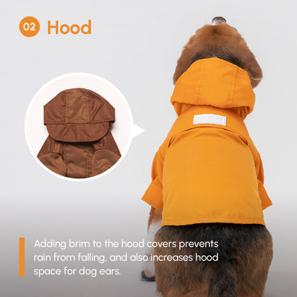 Dog wearing an egg yolk yellow raincoat with a hood, featuring text about the hood's design.