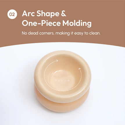 Beige ceramic bowl with arc shape and one-piece molding on a white background
