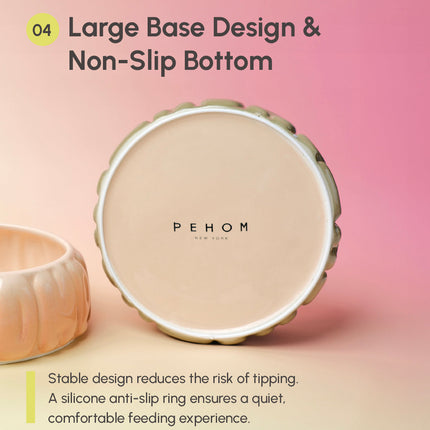 Round feeding bowl with 'PEHOM' branding on a pink background