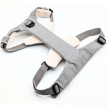 Gray and beige baby carrier on a white background