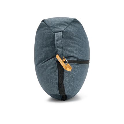 Blue bag with gold carabiner hooked on a blue bag on a white background