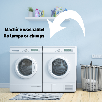 White washing machine and dryer set against a light blue wall with cleaning supplies on a shelf.