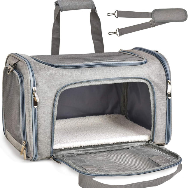 Gray pet carrier with open front door on a white background