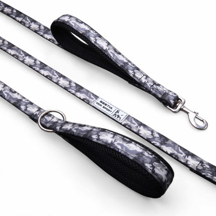 Dog leash with white and gray camouflage pattern and black handle on a white background