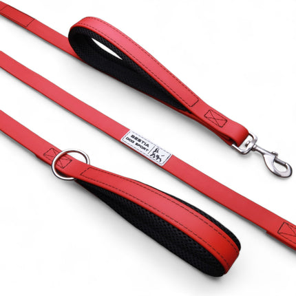 Pink/Red dog leash with black handle on a white background