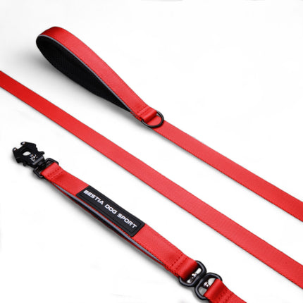 Red dog leash with black clip on a white background