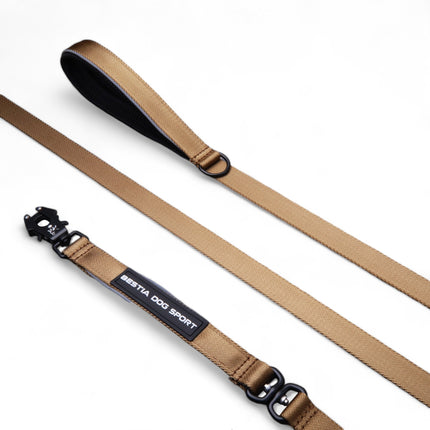Beige dog leash with black clip and 'Beastie Dog Sport' label on a white background