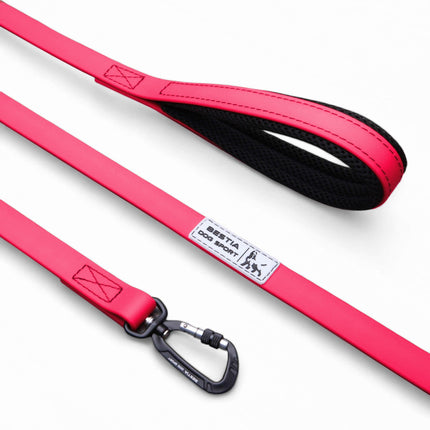 Pink dog leash with black clip and carabiner
