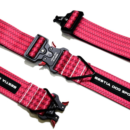 Pink/Red dog collar with visible branding on a white background