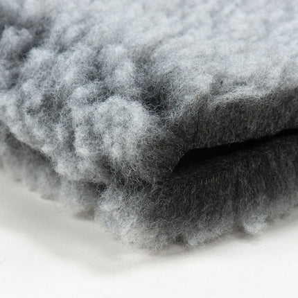 Close-up of gray wool fabric on a white background