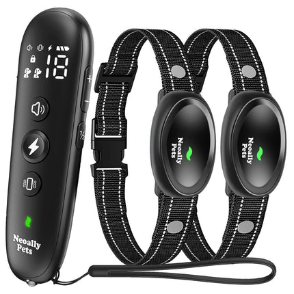 Black electronic pet training device with two collars and a remote control on a white background.