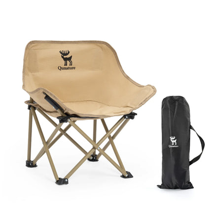 Beige folding chair with black carrying bag on a white background