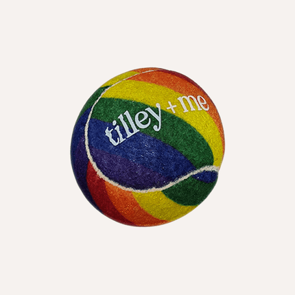 Colorful ball with 'tilley + me' branding on a white background