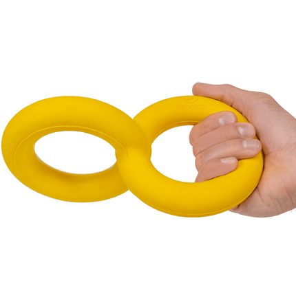 Hand holding two yellow rubber rings against a white background